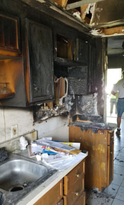 Fire damaged kitchen.